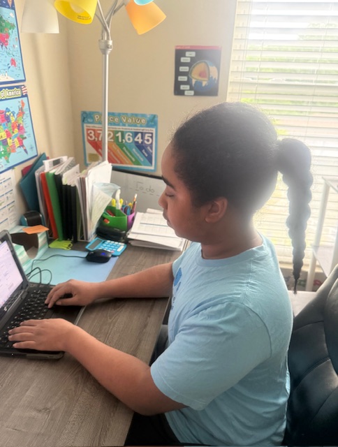 Dylan at Desk for Website 6-16-26